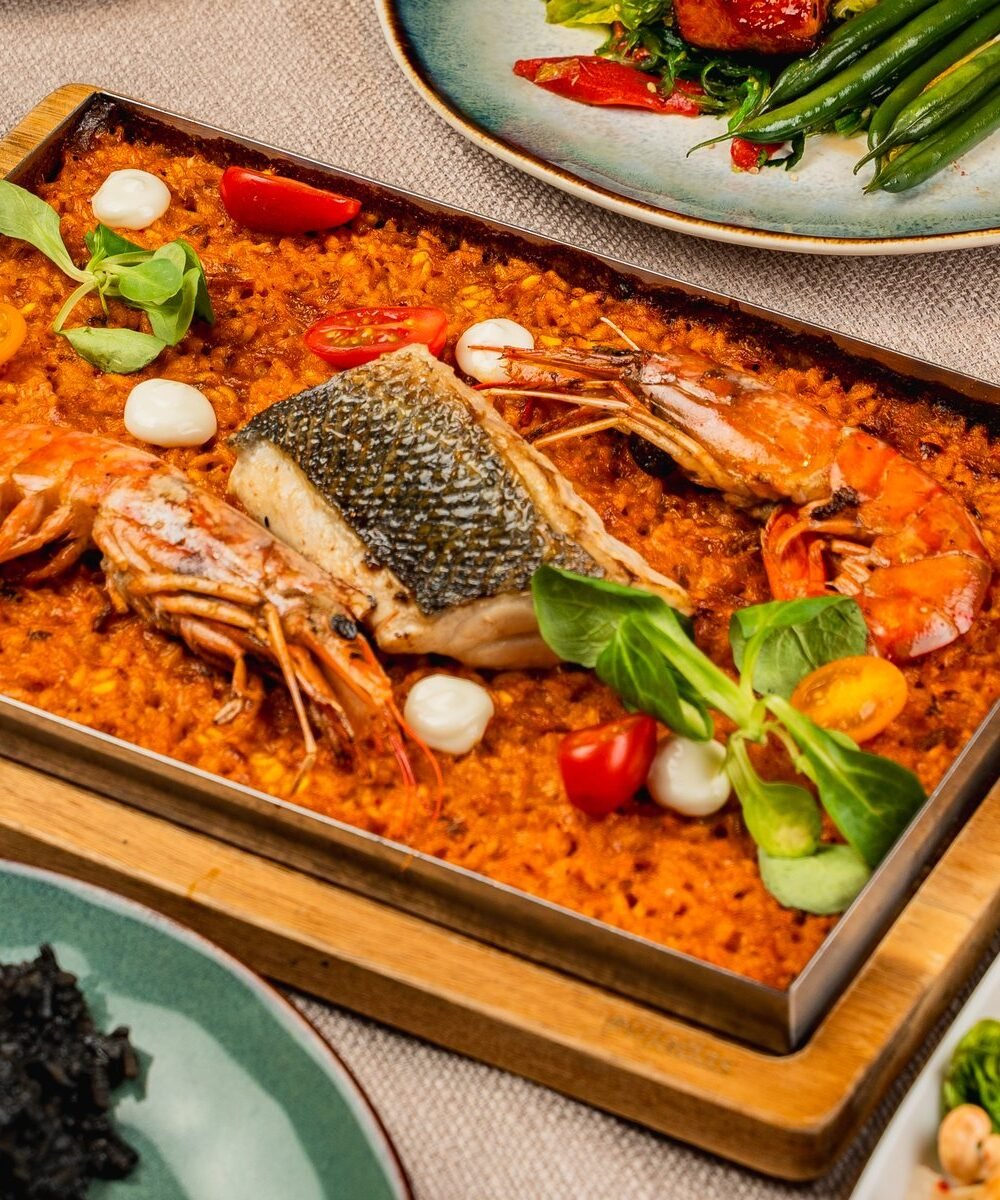 Fotos para la carta de un restaurante: arroz con marisco y platos para compartir en Ca Nostra