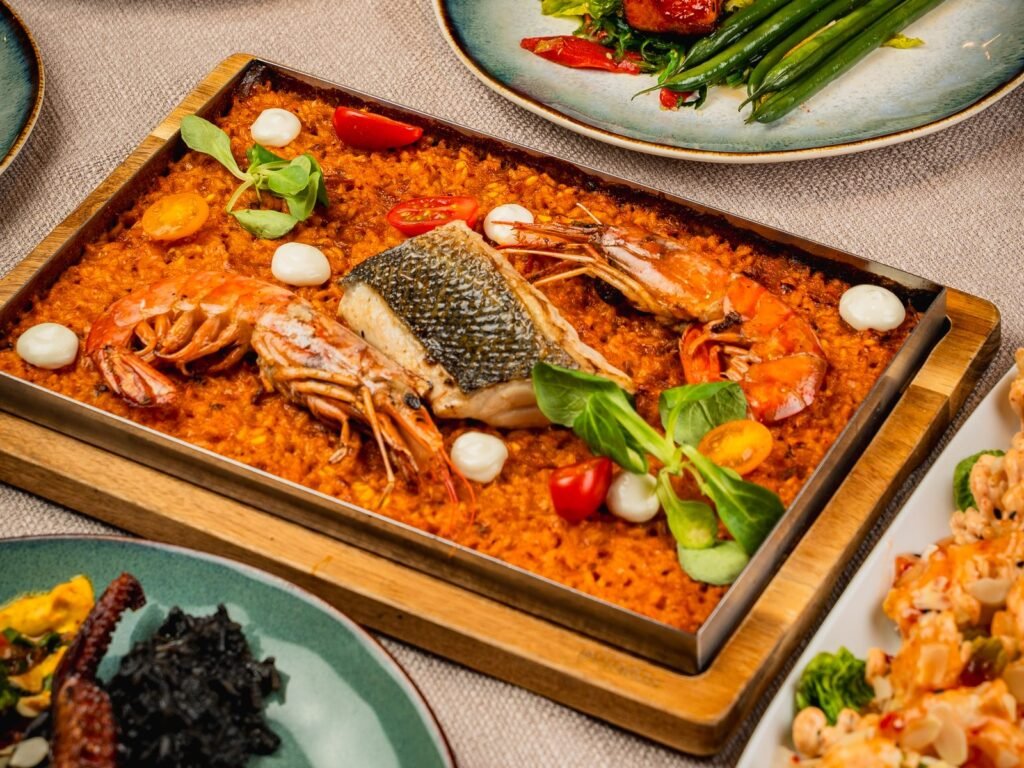 Fotos para la carta de un restaurante: arroz con marisco y platos para compartir en Ca Nostra